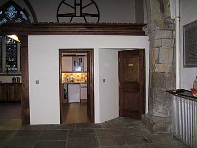 Kitchen door to the left and door to the toilet on the right