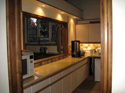 View through the kitchen door with serving hatch doors open